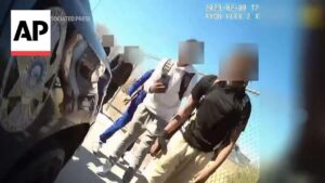 Police reports and video released of campus officer kneeling on teen near Las Vegas high school – PBS