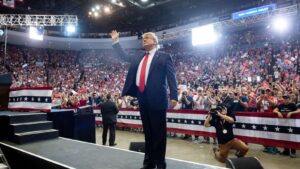Man arrested near Trump’s California rally with loaded guns, police say – The Guardian
